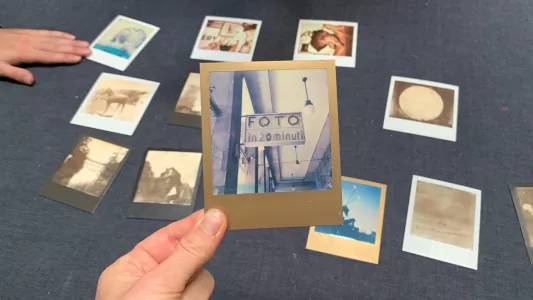 Lisa Boccini, The club reviews Polaroids by Lisa Boccini during one of its sessions.