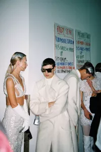 sarah shen. The final lineup before the show. Models stand in order of how they will be walking down the runway.