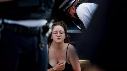 sam davis. Animal rights activist being arrested outside the Canadian embassy protesting Bill 156, London 2020