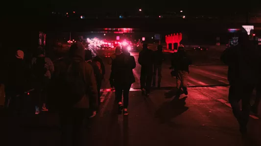 AMBER JAMES. Marching to the substation again, after police retreated inside we celebrated by taking half the highway and marching back downtown.